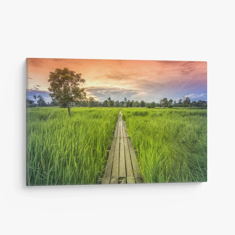 Leinwandbild sonnenuntergang über einer hölzernen brücke in Khonburi