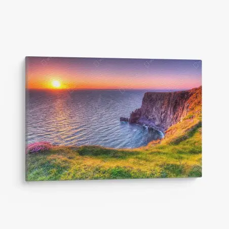 Leinwandbild sonnenuntergang über zerklüfteten küstenklippen – Wallnifity®