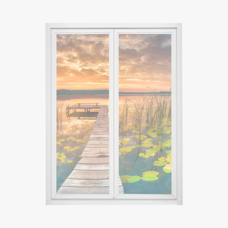 Fensteraufkleber sonnenaufgang über stillem see mit hölzernem steg