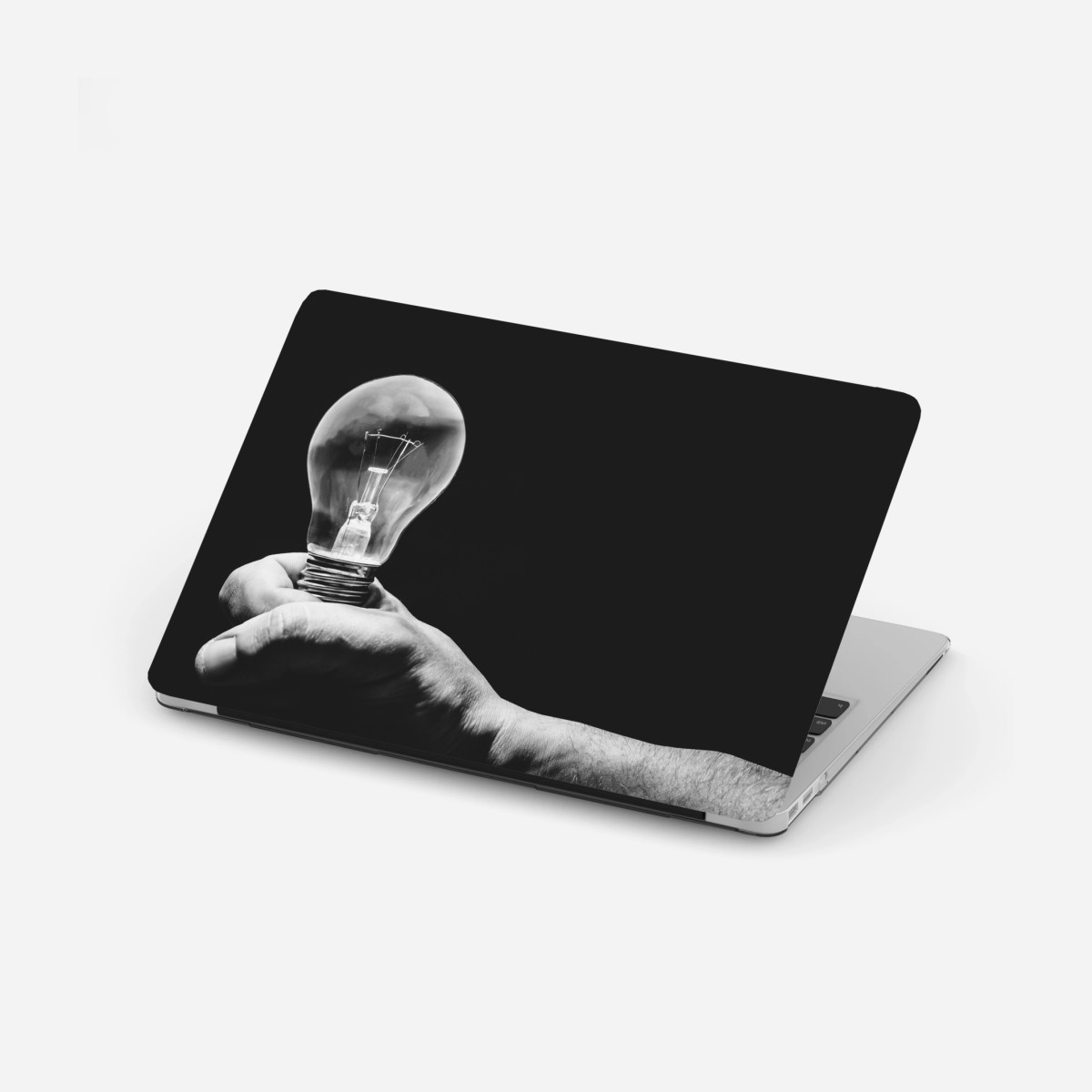 Laptop-Aufkleber monochrome hand hält glühbirne – Wallnifity®