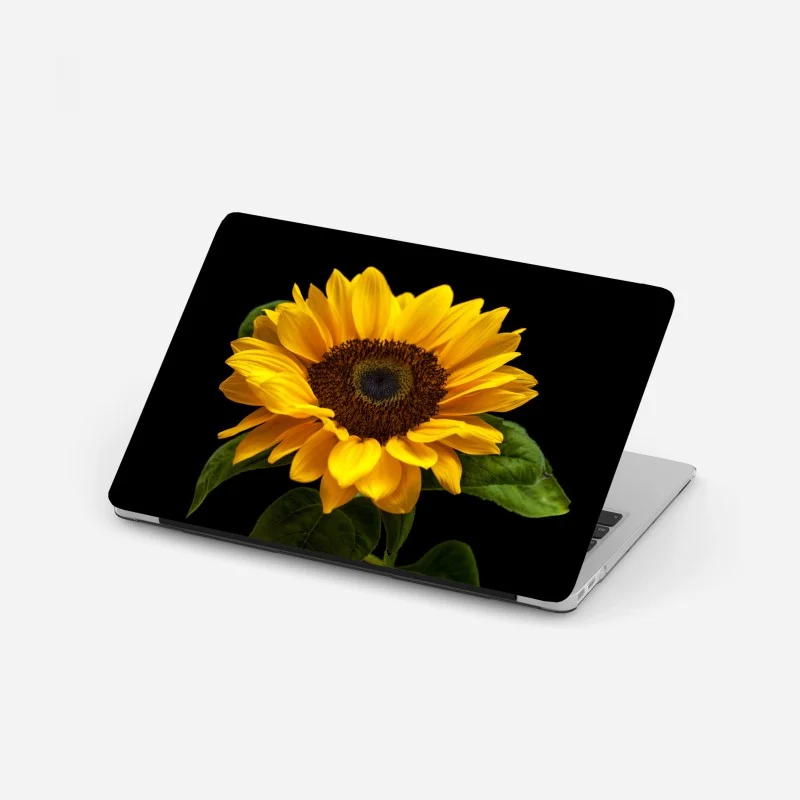 Laptop-Aufkleber leuchtende sonnenblume auf schwarzem hintergrund