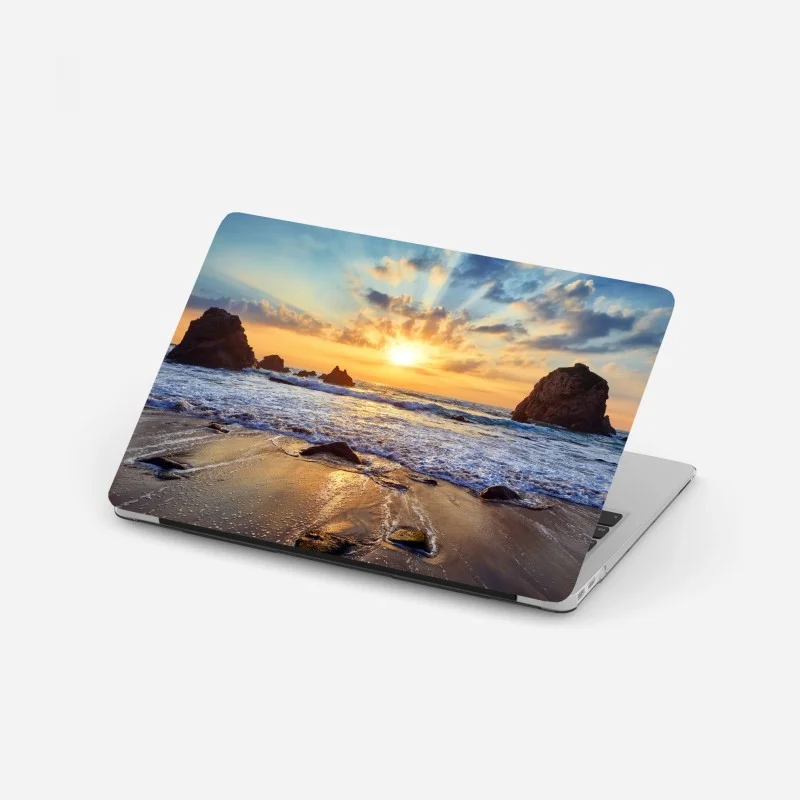 Laptop-Aufkleber sonnenuntergang an der felsigen küste