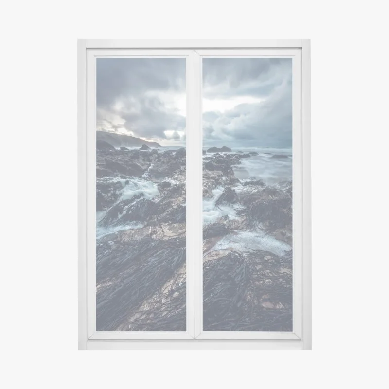 Fensteraufkleber stimmungsvolle felsenküste bei dämmerung