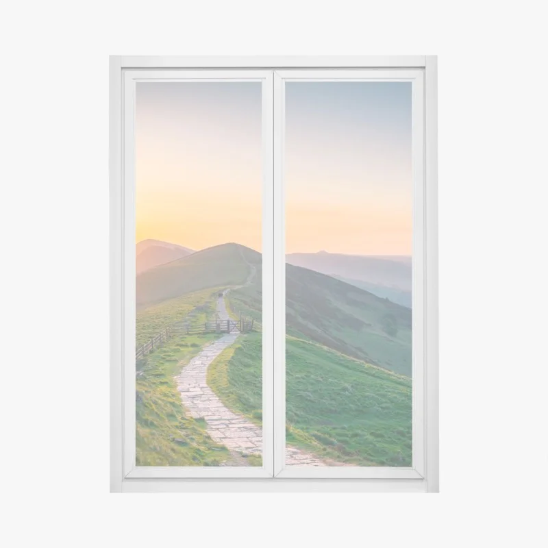 Fensteraufkleber sonnenaufgang über grünen hügeln mit steinweg