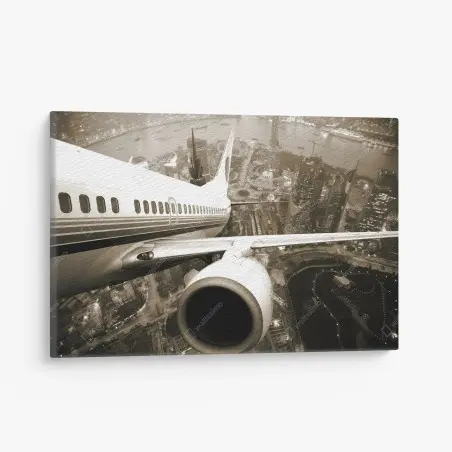Leinwandbild sepia luftaufnahme über der stadt mit flugzeugflügel – Wallnifity®