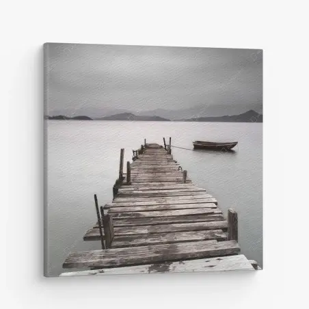 Leinwandbild einsamer steg und boot über ruhigem meer – Wallnifity®